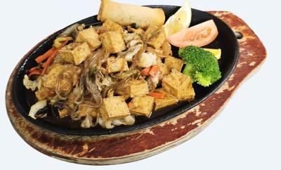 Vegetarian. Tofu stir fried with vegetables & Korean style soy sauce. Tofu Bulgogi